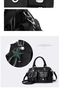 Détail de la texture cuir noir avec fermeture éclair argentée et pendentif étoile perle