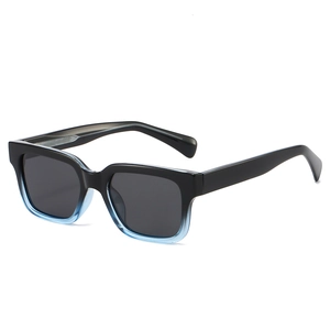 Square black gradient blue sunglasses with polarized lenses on a white background