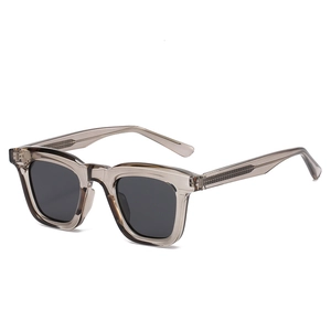 Retro square oversized sunglasses in transparent smoke grey frames with dark lenses