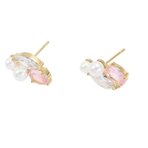 Elegant gold curved earrings with pink gemstone and white pearls in a cluster design