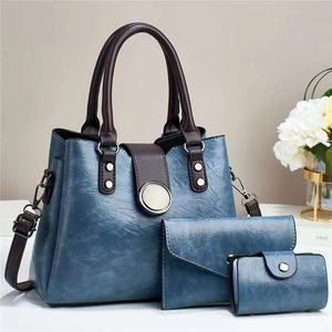 Three-piece retro blue tote set with handbag, wallet and card holder in oil-wax texture
