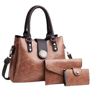 Three-piece brown PU leather handbag set with shoulder bag, clutch, and card holder