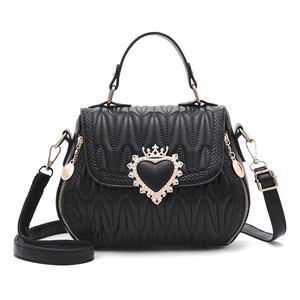 Black shell-shaped quilted handbag with golden crown heart lock and adjustable strap