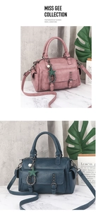 Close-up of pink and navy blue leather handbags with star pendants and pearl details