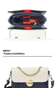 Internal structure showing compartments and gold hardware of the contrast leather bag