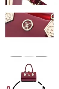 Detailed view of burgundy patent leather handbag with golden floral rivets and clasp