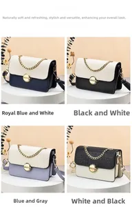 Detail view of four-color leather handbags with crocodile pattern and metal chain