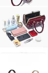 Detailed interior of burgundy patent leather handbag showing large storage capacity