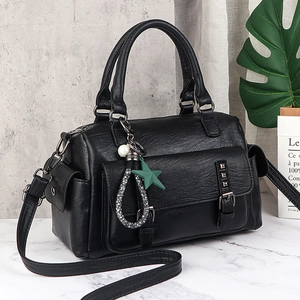 Large capacity black faux leather Boston bag with side pockets and star charm