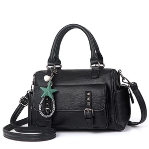 Large capacity black faux leather tote bag with punk studs and green star charm