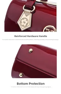 Detail of red patent leather bag showing gold hardware and protective base metal feet