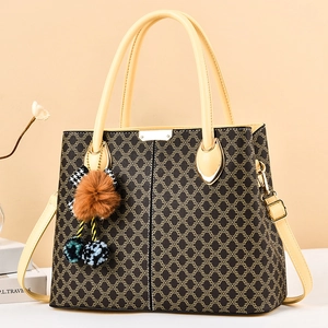 Sac fourre-tout à motif de chaîne avec imprimé géométrique doré et pompon décoratif