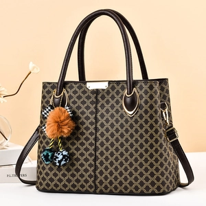 Sac à bandoulière rétro à motifs géométriques avec finitions dorées et pompon