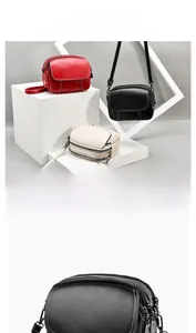 Close-up of stylish triple-layer lychee grain leather crossbody bag in multiple colors
