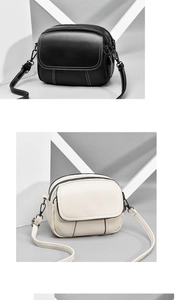 Detail of lychee pattern PU leather and triple zipper pockets on the crossbody bag