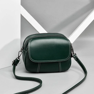 Three-layer dark green pebbled leather crossbody bag with stylish contrast stitching