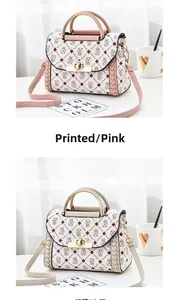 Detail of pink and white handbags with bear prints and elegant metal circular handles