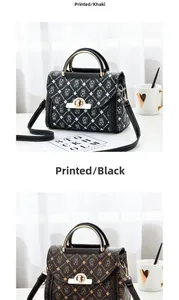 Detailed view of black and khaki handbags with teddy bear prints and gold metal twist locks