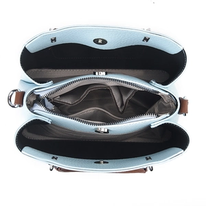 Top view showing the three compartments and geometric patterned lining of the tote bag