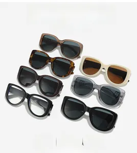 Multiple stylish oversized cat-eye sunglasses in various colors like tea and tortoise