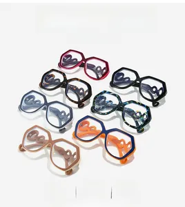 Macro detail of geometric square eyewear showing stylish chain link temples in various colors