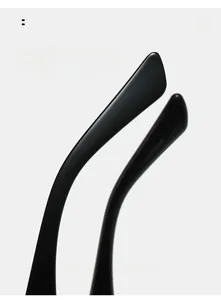 Macro shot of ergonomic curved black temple tips for comfortable fit on cat eye sunglasses
