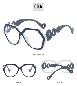 Detail view of square glasses with oversized geometric frames and hollow chain temples