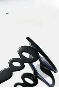 Close-up of stylish black square frames with unique wavy hollow temples and glossy finish