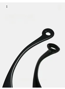 Detail of curved black glossy eyewear temple with ergonomic arc and round cutout design