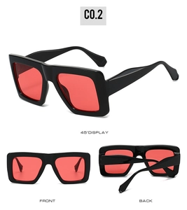 Three-angle display of square oversized sunglasses with black frames and red lenses