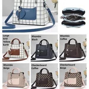High-quality faux leather tote bag with diverse patterns and heart charm pendant