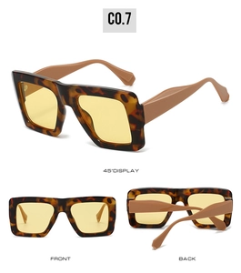 Detailed views of vintage oversized square sunglasses with tortoise frame and yellow lenses