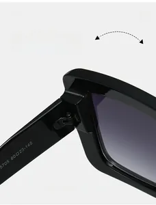 Close-up of durable metal hinge and 5705 60-23-145 size marking on black square frames