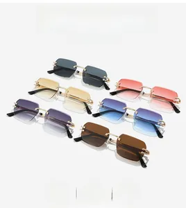 Macro detail of rimless polygonal sunglasses with golden leopard claw metal accents