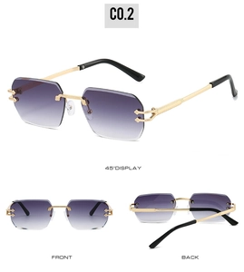 Detail showing gradient purple lenses and golden engraved temples on rimless sunglasses