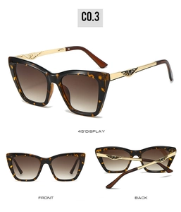 Detail view of tortoiseshell cat-eye sunglasses with gold temples and geometric relief