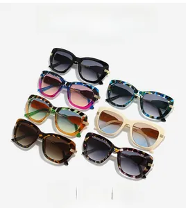 Collection of oversized square cat-eye sunglasses in multiple stylish colors and patterns