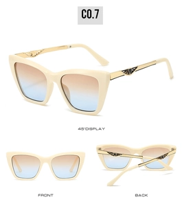 Detailed views of cream cat-eye sunglasses with gradient lenses and gold wing metal temples