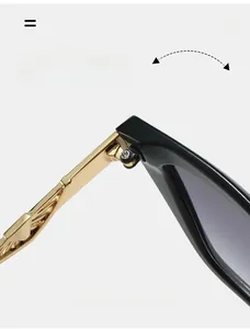 Detailed macro of durable gold textured metal hinges on cat-eye sunglasses