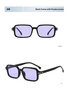 Detail view of stylish square black sunglasses with purple lenses and metal hinges