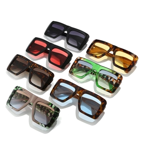 Oversized square flat top sunglasses in various color frames and tinted lenses