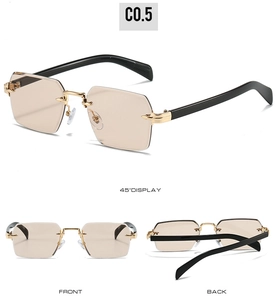 Détail de lunettes de soleil carrées sans monture avec charnières or et verres dégradés