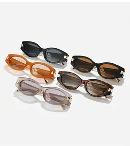 Details of cat-eye sunglasses collection with gold metal accents and slim temples
