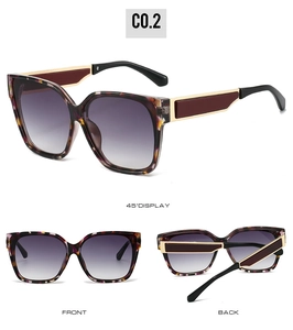 Detail of square oversized sunglasses with tortoiseshell frames and gradient lenses