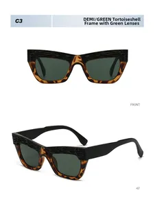 Close-up of demi tortoise frame sunglasses with green lenses and textured top edge details