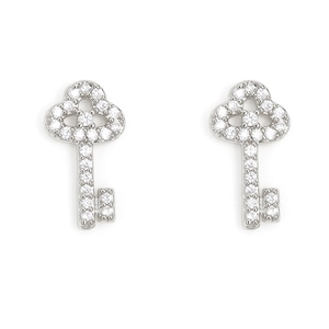 Detailed macro shot of luxury key-shaped silver earrings with sparkling zircon stones