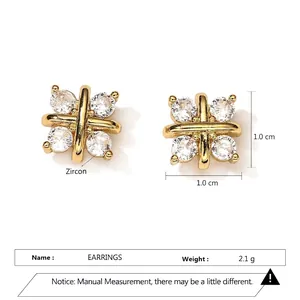 Boucles d'oreilles dorées en forme de X avec zircons et design croisé pour femme