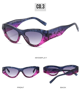 Detail view of cat eye sunglasses with blue-purple gradient and zebra print frame
