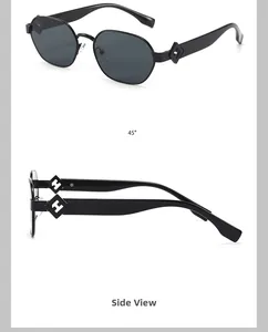 Détail de lunettes de soleil carrées avec décoration élégante du logo H sur la charnière