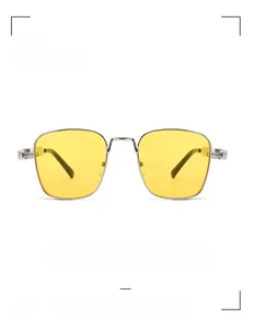 Detail of silver geometric frame and yellow lenses with intricate metal knurling temple
